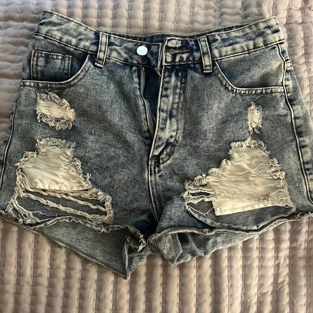 Worn. But in great shape! Very cute jean shorts from shein!
